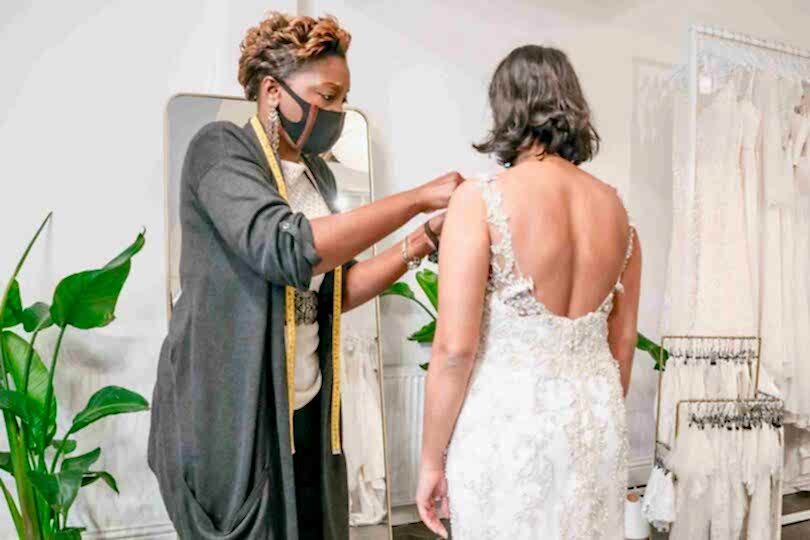 Shortening Wedding Dress straps in our bridal boutique in London