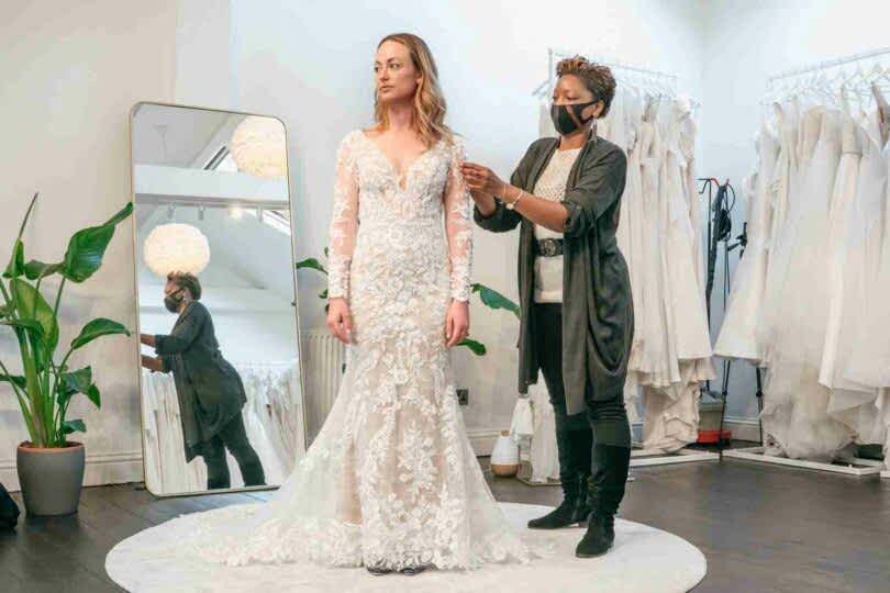 Pinning a Wedding Dress in our bridal boutique in London