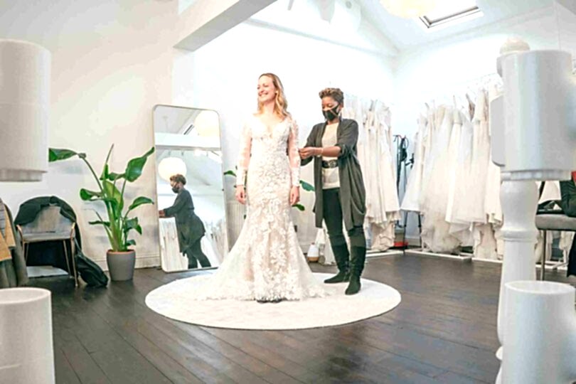 Pinning a Wedding Dress in our bridal boutique in London