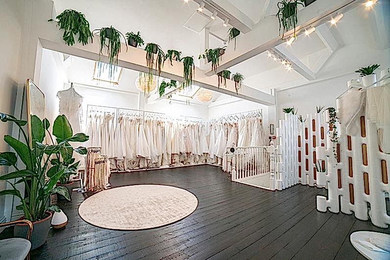 Private room in bridal shop in London featuring a collection of over 150 wedding dresses.