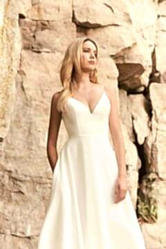 A model wearing Mikaella Style 2327