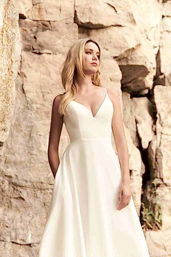 A model wearing Mikaella Style 2327